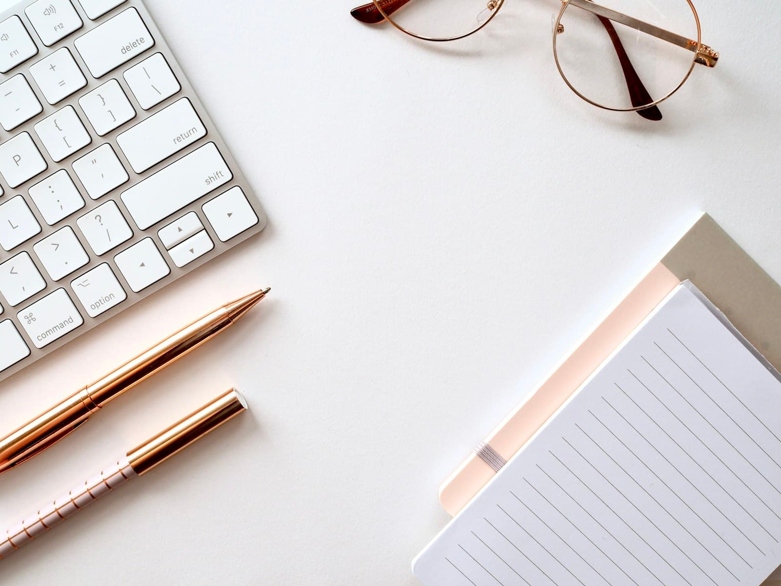 Quiet dawn-lit desk surface with a coffee cup and notebook — clean focus aesthetic.